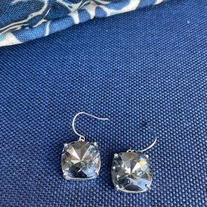 Platinum-colored cushion stone with silver drop earrings